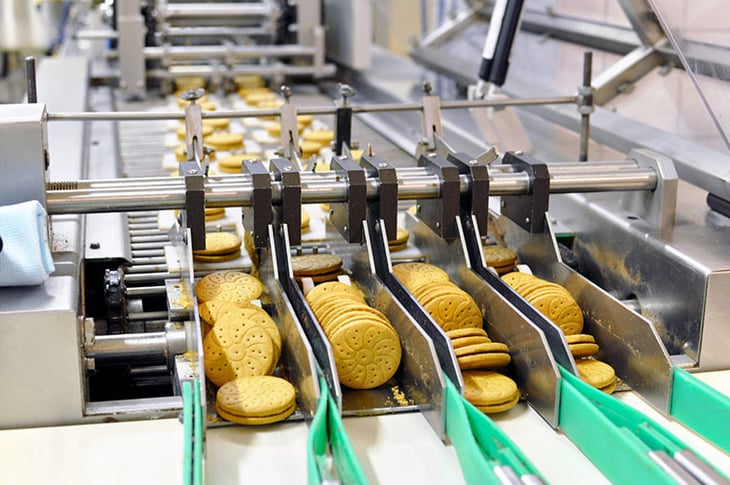 Reducing scrap levels in a snack food manufacturing line