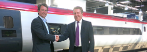 Design Triangle Director Andrew Crowshaw in alliance with 42 Technology Ltd in front of high speed train 