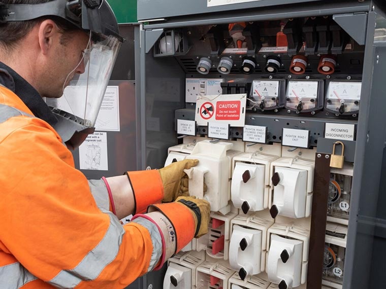 Engineer installs FuseOhm into electricity substation