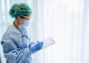 Female healthcare worker wearing PPE