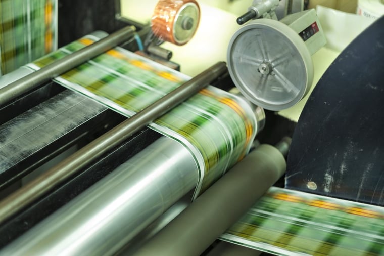Print roller printing green packaging wrap at high speed